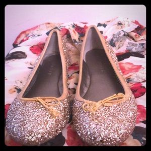 gold sparkly flats.